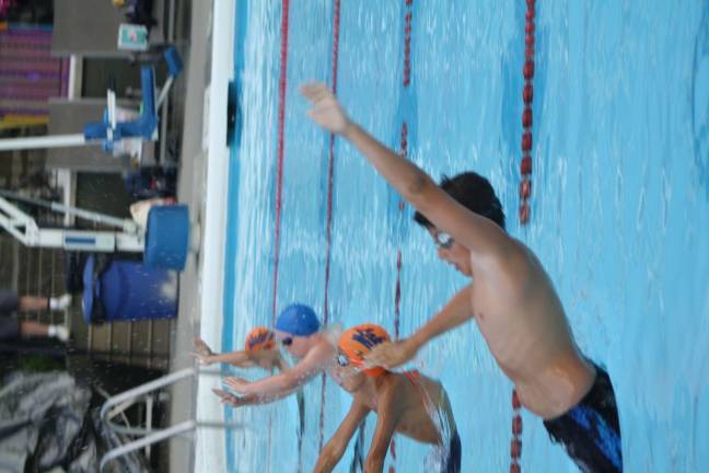 Boys 9-10 take off for the 50M back stroke at last Wednesday's season opener at Lake Mohawk Pool. Photos by Rose Sgarlato