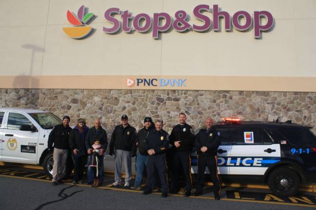 Sparta Chief of Police Neil Spidaletto. Carol Novrit of Sussex County Food Pantry, Steve Scro of Mohawk House, Peighton Spidaletto, Lieut. Dennis Proctor, Cpl. Scott Elig, Lieut. John Lamon, Officer Tom Herd and Byram Chief of Police Pete Zabita outside Stop &amp; Shop for this year&#x2019;s Cram the Cruiser/Stuff the Bus 2017. All donations were transported to the Sussex County Food Pantry in Newton.