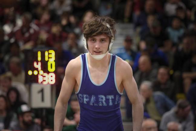 With his eyes on States, Cooper Stewart is all business as he enters his match.