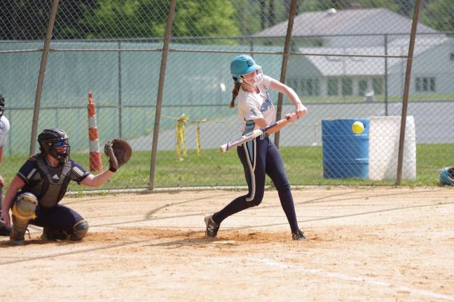 Sparta batter Olivia Bouma-Hannam takes a swing in the fourth inning. Bouma-Hannam had one hit and scored a run.