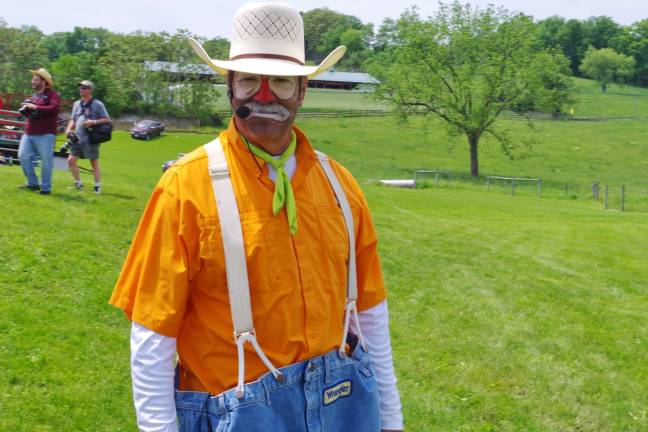 Rodeo clown Hollywood Harris (Cliff Harris) smiles for a portrait. He kept the competitors safe and the spectators entertained. Harris has spent more than 30 years in the rodeo business.