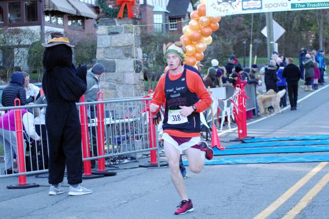 Gavin Deyoung of Tranquility, N.J. finishes the 5K in ninth place with a time of 18:13.