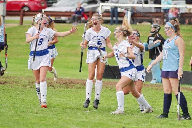 Third from the left Kittatinny's Nellie Choma and her teammates celebrate her goal.