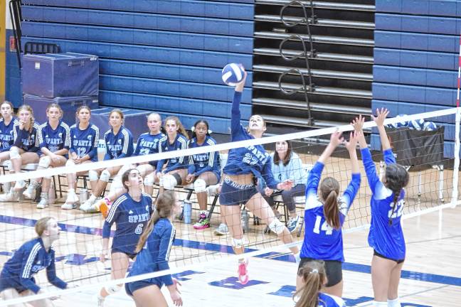 Sparta’s Avery Munier strikes the ball in a game against Westfield at home Sept. 19. The Spartans lost, 2-1. (Photos by George Leroy Hunter)