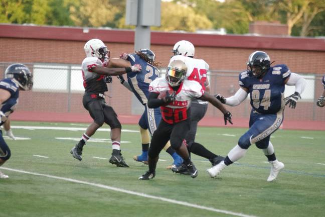 A Silk City ball carrier on the move.