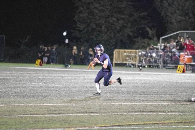 <b>Jefferson quarterback Eric Hokenberg passed for 303 yards.</b>
