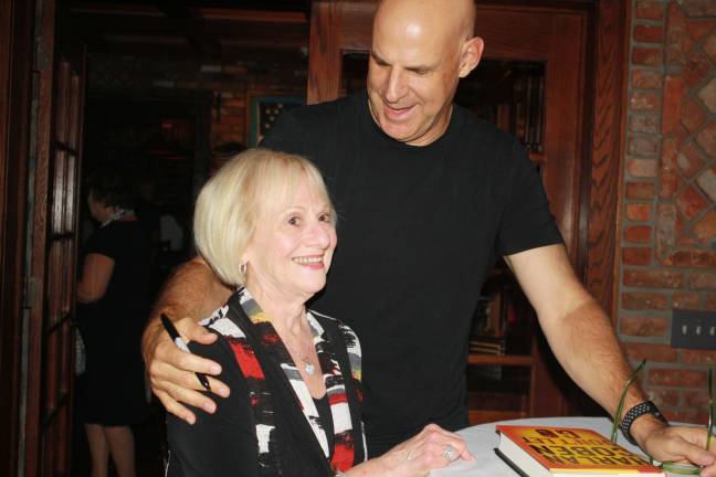 Lucky lady Linda Brecher is the first one to get Harlan Coben's &quot;Don't Let Go &quot; signed by the New York Times Bestselling author.