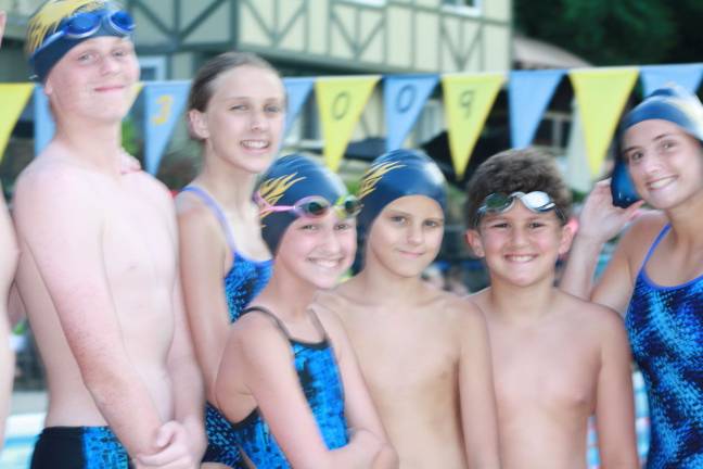 Josh Bharimoski, Olivia Flanz, Molly Englehardt, Brendan Del Coro, Luca O'Krepky and Samantha Russo smile for the camera.