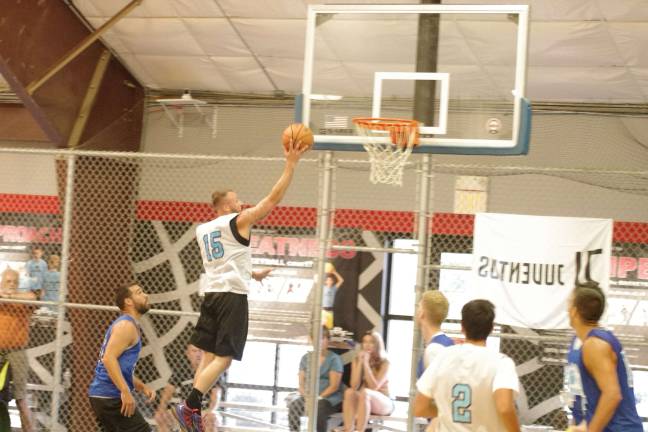 Team Tobin's Matt Tobin moves on the hoop.