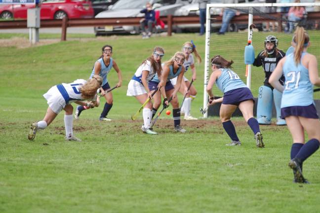 Far left Kittatinny's Nellie Choma swings her stick and hits the ball towards the goal post in the first half. The ball made it inside for the sole score.