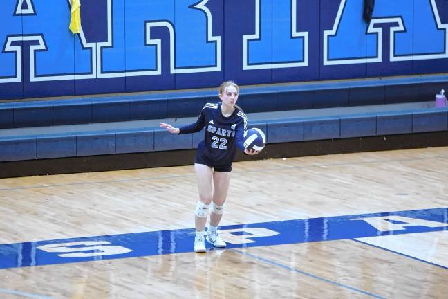 Sparta's Hannah Dodson in the midst of a serve.