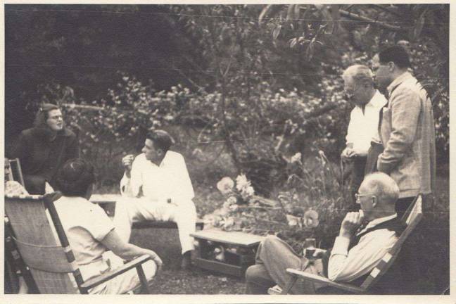 Burke with friends at the Andover farm, circa 1950. From left, author Shirley Jackson, (with back to camera) educator Marion Fergusson, literary critic and educator Francis Fergusson, Kenneth Burke, literary critic Stanley Hyman and (seated) poet William Carlos Williams.