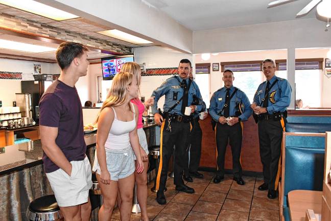 Michael Lombardo and Reese and Olivia Redden, all of Fredon, meet New Jersey State Police officers at a Coffee with a Cop event Tuesday, Aug. 5 at Jumboland Diner in Branchville. The officers are Trooper W. Weiss, Sfc. David Balbo, Lt. Gregory Redden and Capt. Robert Babitz.