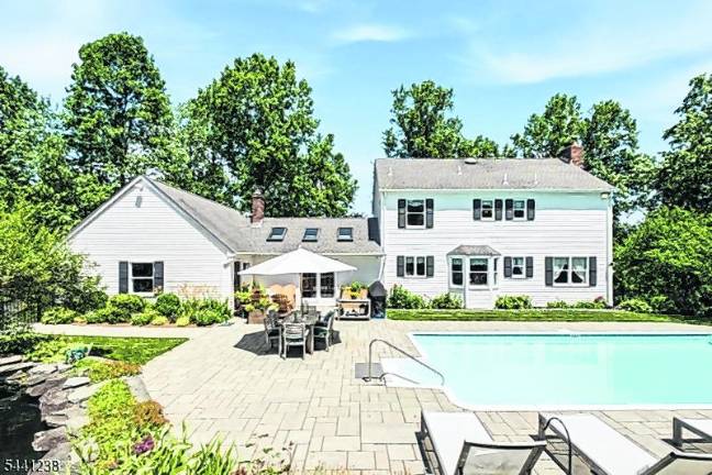 Sparta colonial features classic den, outdoor oasis