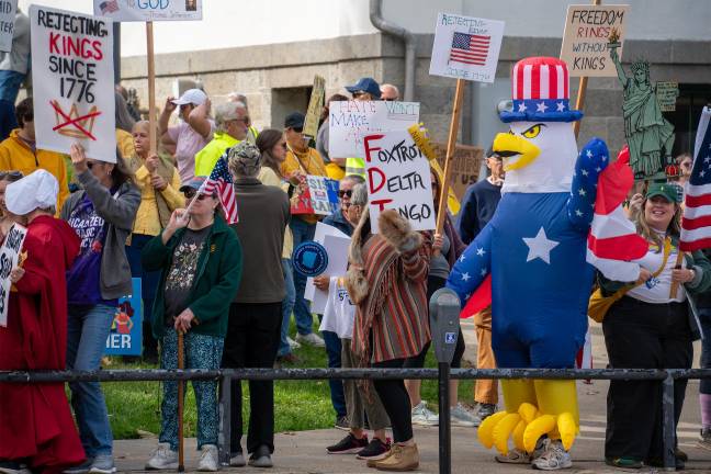 An estimated 600 people came to Newton for Saturday’s “No Kings” rally.
