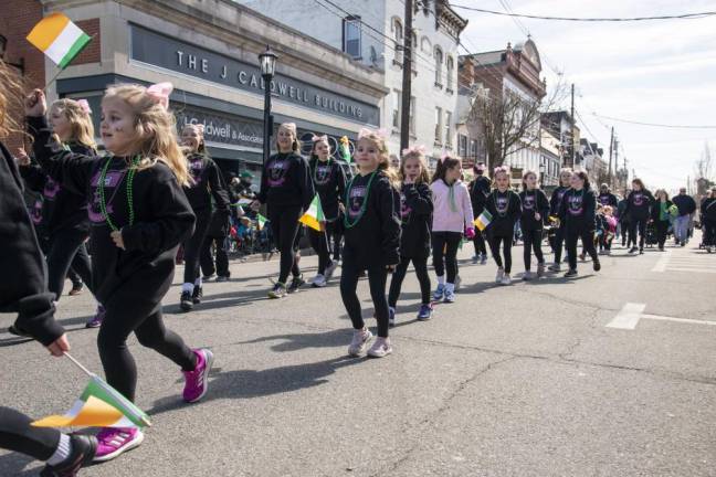Children from the Lenahan School of Irish Dance march in the parade.
