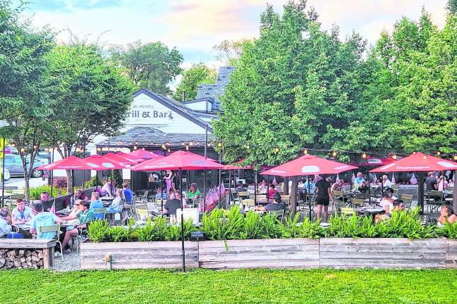 The exterior of St. Moritz Grill &amp; Bar is shown.