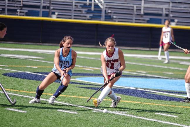 Sparta's Annie Soreco and Morristown's Zoie Dvorscak pursue the ball in their game Sept. 27. The Spartans lost, 5-1. (Photos by George Leroy Hunter)