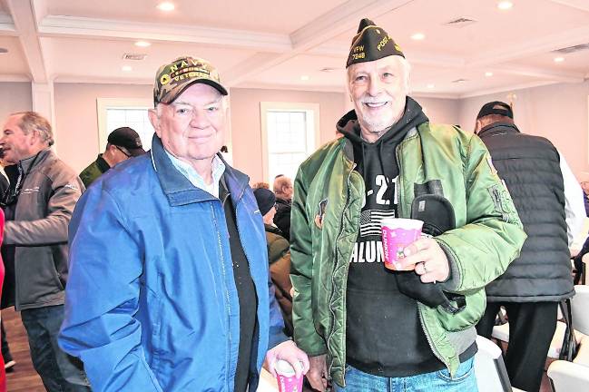 Navy veteran Mike Madden and Air Force veteran Gary Emmich are shown.