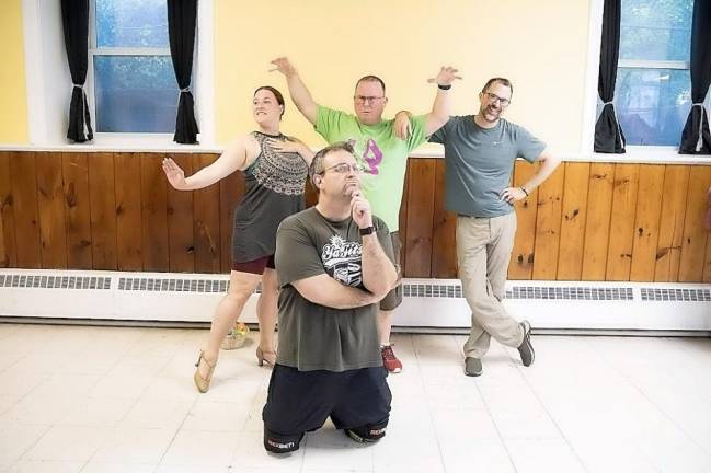 Russ Crespolini, of Randolph, as Lord Farquaad; Kimberly Jackson, of Lafayette, as Fiona; Todd Smith, of Sparta, as Shrek; and Nathan Simmons, of Sparta, as Donkey, rehearse for “Shrek The Musical.”