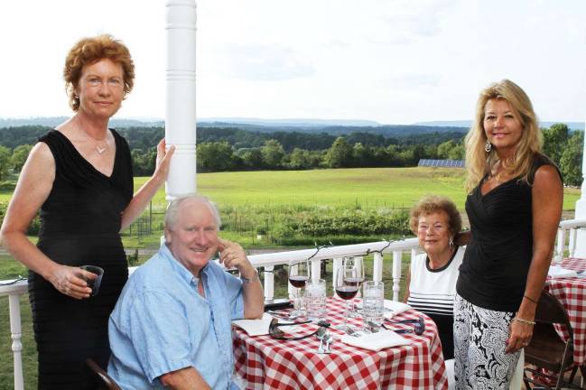 From last year's feast, from left, owner of Sunset Vista Farms Linda Grinthal, Ed Kazar, Julia Heid, Carolyn Kazar