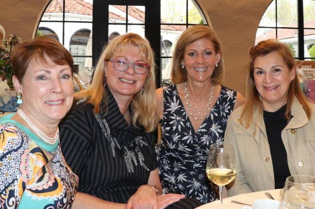 Members with their guests at at the 2019 fashion show.