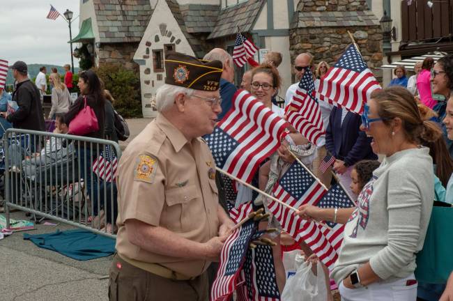 Sparta Councilman Jerry Murphy handing out flags
