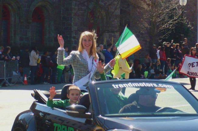 Brielle Takacs-Senske, Hunter Takacs and Lauren Cunico at the March 9 Morristown Parade in a car provided by Trend Motors.