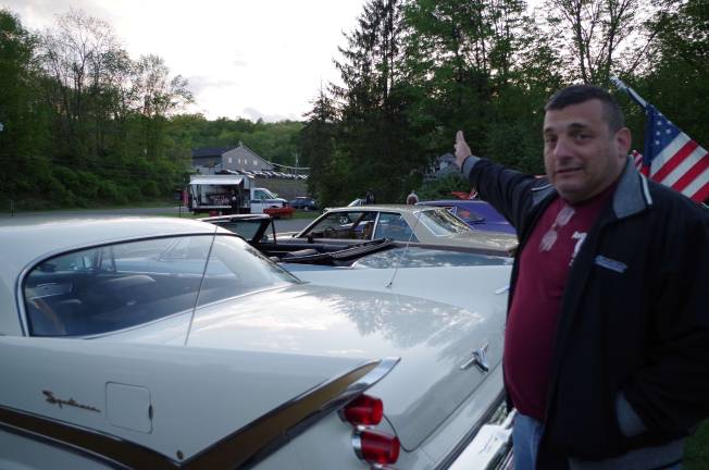 Victoria Diner owner Michael Hatzimihalis talking about the cars. Hatzimihalis is also a Rockaway Township police officer.