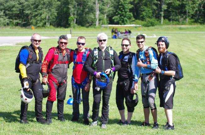Skydivers Tadeusz Wyrzykiewicz, Rey Duarte, Chris Noonan, Dan Faltyn, Amir Meir, Tyler Delino and Moshe Balalo.
