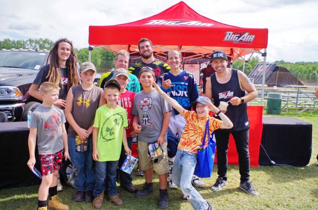 In the back row stuntmen J.R. Hinds, Derek Burlew, Adam Thene and Derek Guetter pose with fans.