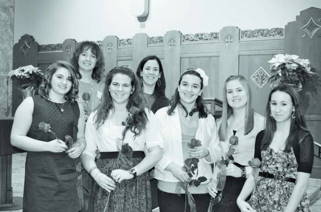 Standing front row from left include: Treasurer Samantha Vertucci, Chief Squire Rose Tara More, Ceremonial Guard Nicole Regelski, Secretary Kalin Hagedorn, and Deputy Chief Squire Rose Melissa Di Santi. Standing in the back are Blessed Kateri Rose Co-Counselors Lisa More and Ana Di Santi