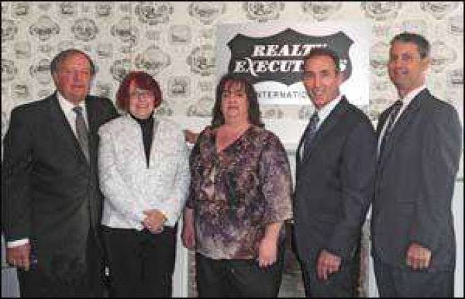 Marquis Agency merges with Realty Executives