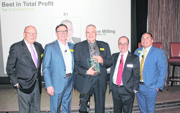 From left, Jim Weichert, founder and CEO, Weichert Companies; Aram Minnetian, president, Weichert Companies; Andrew Milling, branch vice president, Weichert, Realtors; Joe McDonald, president of Residential Sales and Real Estate Services for Weichert, Realtors; and Jim Madl, regional vice president, Weichert, Realtors
