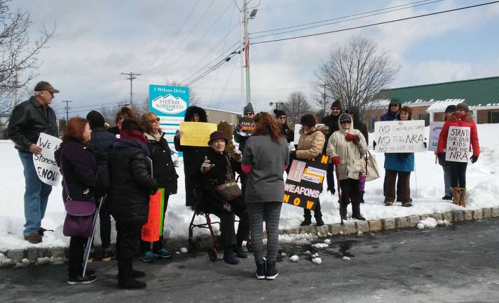 Members of the Brady Campaign protest gun violence outside the local offices of state legislators. Photos by Meghan Byers