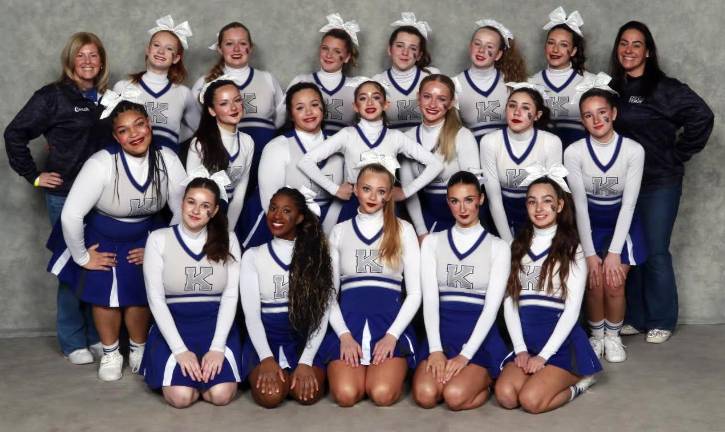 Cheer Coach Sam Lupo (far right) with her champion Kittatinny High School Cheer Team. She has built the high school program to the point of lots of competition cheer and travel and feels it would be too much on her athletes to do both her program and club while maintaining their academics.