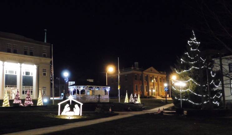 The Green in Newton, Sussex County's only county parkland, greets travelers around the square with a brightly lit menorrah and trees, as well as a nativity scene. 