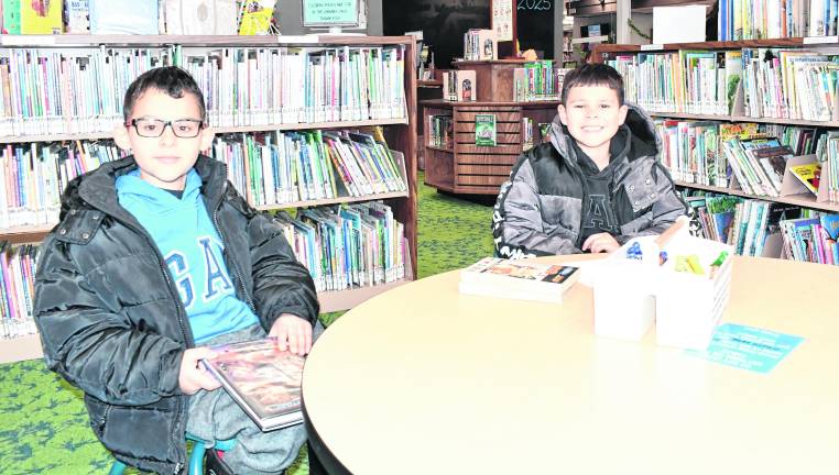 Ethan and Owen Stifler of Sparta are shown.