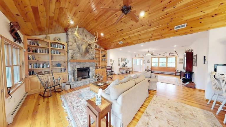 Raised ranch on 3-plus acres is move-in ready with lots of upgrades