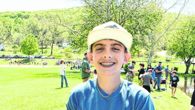 Tyler Barber poses with a fish.