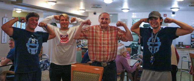 Sam Bushey, Austin Castorina, resident Wayne Earl and Noah Ferria strike a pose for the camera. When asked his age, Wayne Earl replied, 18 ... for many years now.