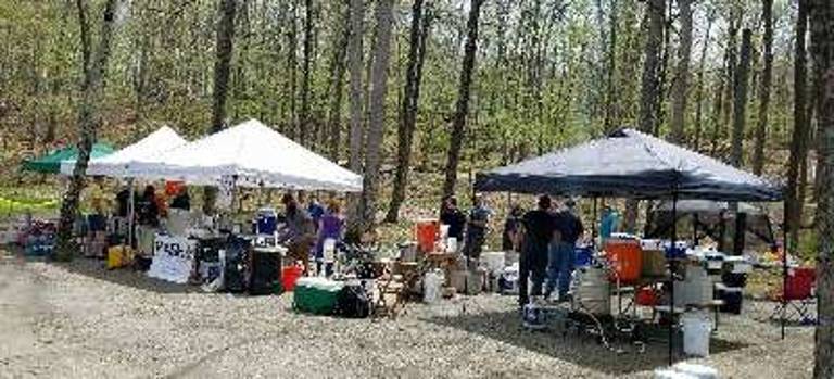 Members of local brewing clubs MASH-NJ and SCUBA set up equipment and begin brewing beer.