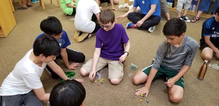 Visiting students from South Korea introduce Hilltop students to Korean games Photo provided