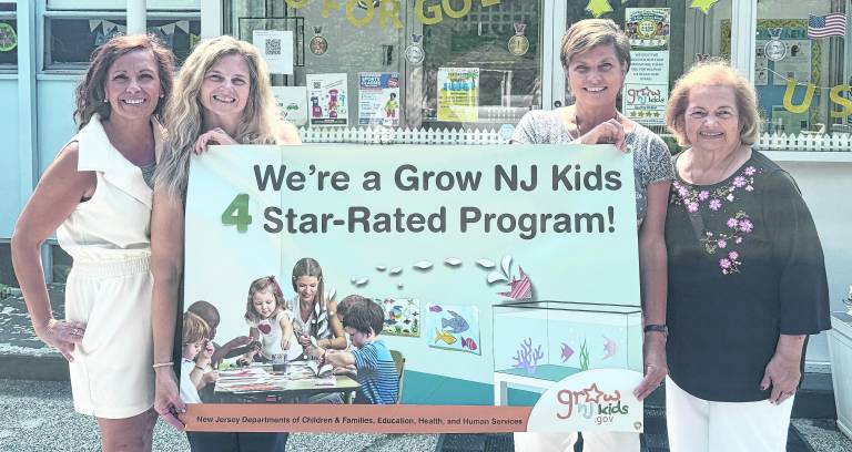 Staff members at Garden Grove Preschool pose for a photo.