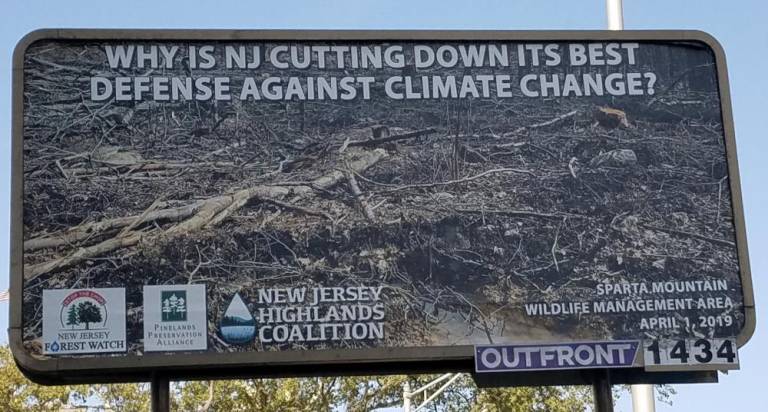 A billboard in Trenton asking state officials why logging is occurring at Sparta Mountain Wildlife Management Area.