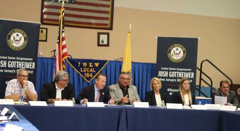 Congressman Josh Gottheimer (D-NJ5) convenes local business leaders, union leaders, and local elected officials at the IBEW Local 164 Meeting Hall. From left: Nat Bottigheimer, Mike Schneider, Congressman Gottheimer, Joseph Sanzari, Lisa Chowansky, Margot Chowansky, State Sen. Paul Sarlo (D-Bergen) Photo provided
