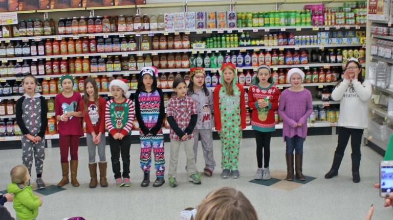 Troop 6255 brings cheer to shoppers