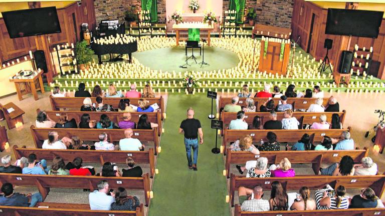 Candles were set up around the sanctuary.