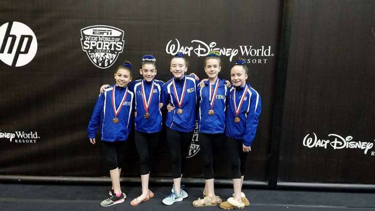 Level 5 gymnasts, from left: Cameron Volpe of Hampton, Meagan Ward of Stillwater, Meghan Smith of Sparta, Fiona Postas of Franklin and Katie Hlywa of Stillwater