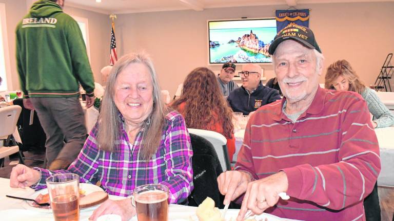 Pat and Gary Emmerich, both of Sparta, enjoy their meal. Gary is a veteran of the Vietnam War.